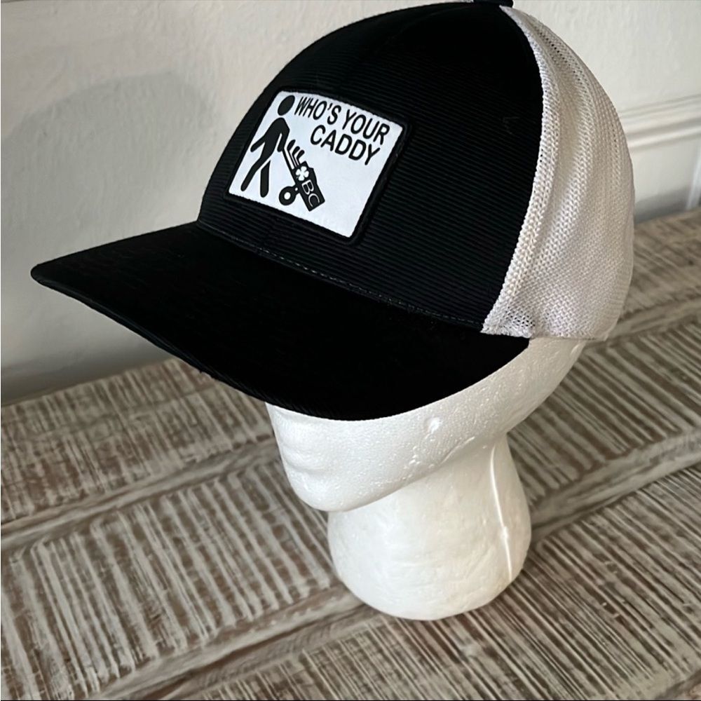 One Ten Black Clover Black and White Golf Trucker Hat “ Who’s Your Caddy”
